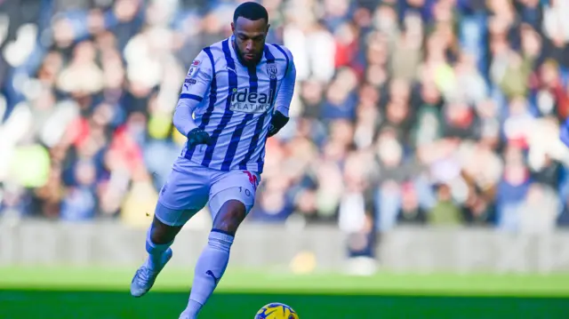 West Brom midfielder Matt Phillips dribbling the ball