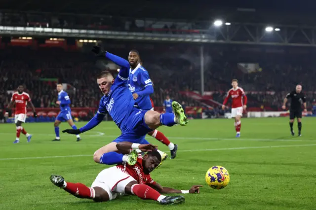 Mykolenko is upended by Aurier on the wing.