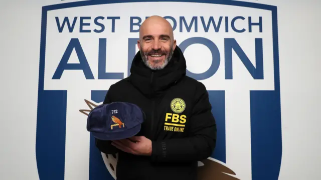 Enzo Maresca holding his cap from West Brom