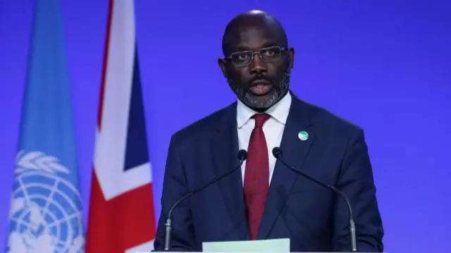 Liberia President George Weah speaks during the UN Climate Change Conference (COP26) in Glasgow, Scotland, Britain, November 1, 2021.