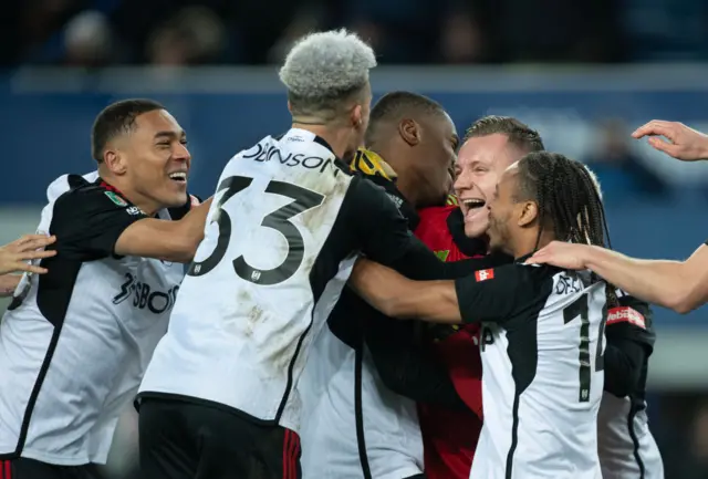 Fulham players celebrate penalty shootout win over Everton in EFL Cup quarter-final