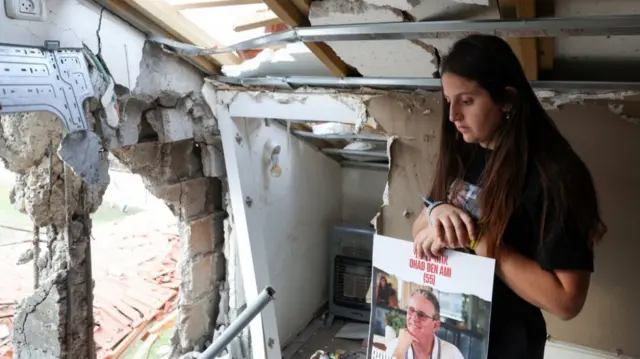 Ella Ben Ami visits her parents' damaged house in Kibbutz Be'eri, 20 December 2023