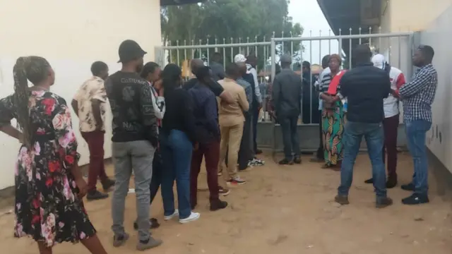 Voters queueing to vote