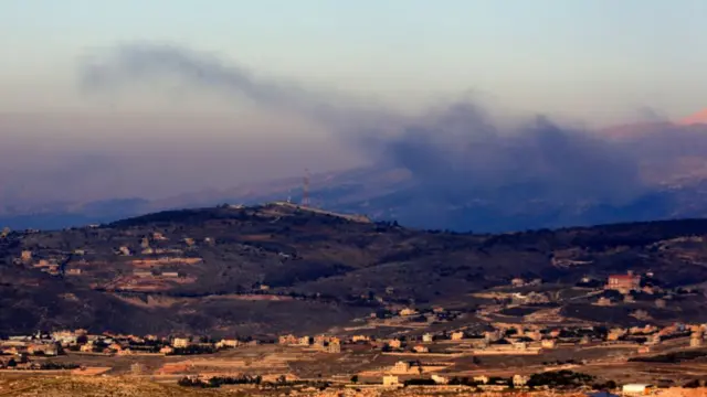 Smoke billows on the outskirts of the village of Kfarshuba, along Lebanon's southern border with northern Israel following Israeli bombardment on December 20, 2023