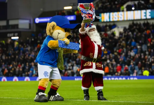 Broxi Bear with Santa Claus and the League Cup