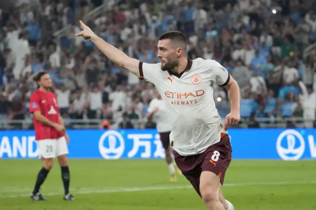 Mateo Kovacic celebrates a goal for Manchester City