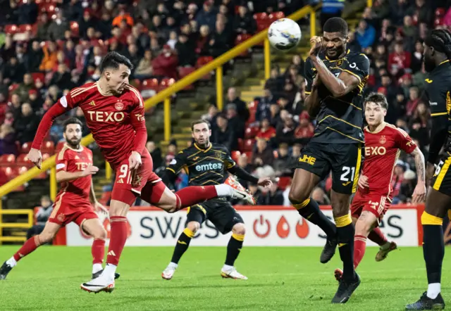 Aberdeen's Bojan Miovski scores to make it 1-1 during a cinch Premiership match between Aberdeen and Livingston at Pittodrie Stadium