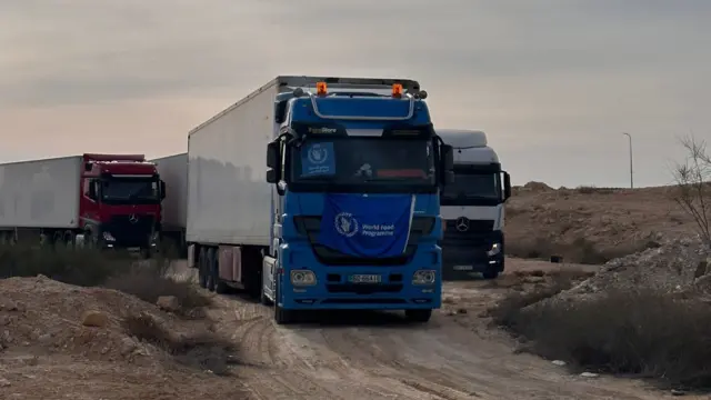 World Food Programme trucks crossing from Jordan into Gaza to deliver food