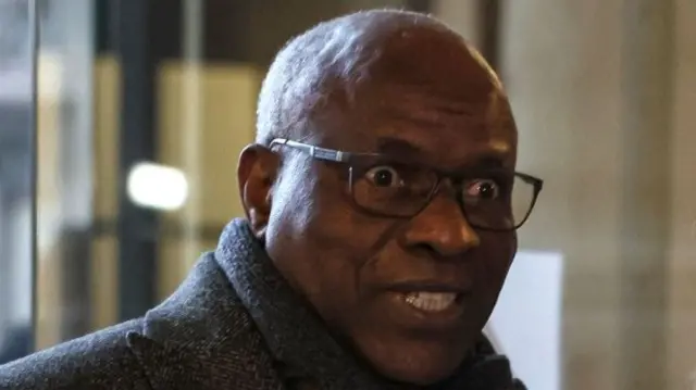 Rwandan doctor Sosthene Munyemana arrives at the Paris courthouse for his trial on charges of genocide and crimes against humanity during the 1994 massacres in Rwanda, on November 14, 2023.