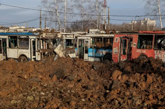 This picture from Wednesday shows the aftermath of a Russian missile strike on the grounds of a transport depot in Kharkiv