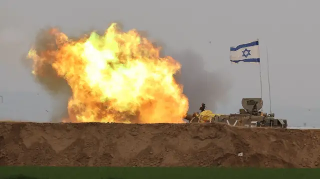 An Israeli artillery unit carries out shelling toward targets in the Gaza Strip from an undisclosed location near the Gaza border, southern Israel, 21 December 2023.