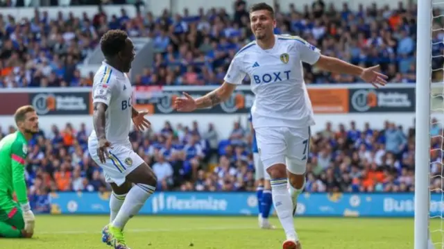 Joel Piroe celebrates scoring for Leeds