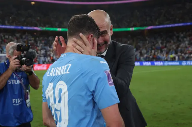 Pep Guardiola and Julian Alvarez celebrate