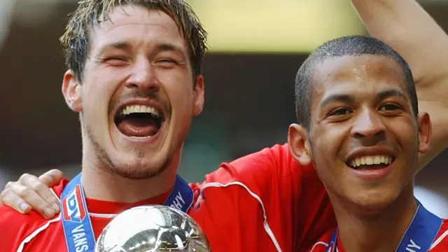 Lee Peacock and Liam Rosenior celebrate after their goals help Bristol City to an LDV Vans Trophy win over Carlisle in Cardiff