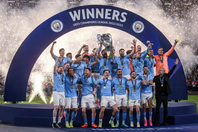 Ilkay Gundogan lifts the 2022-23 Champions League trophy for Manchester City