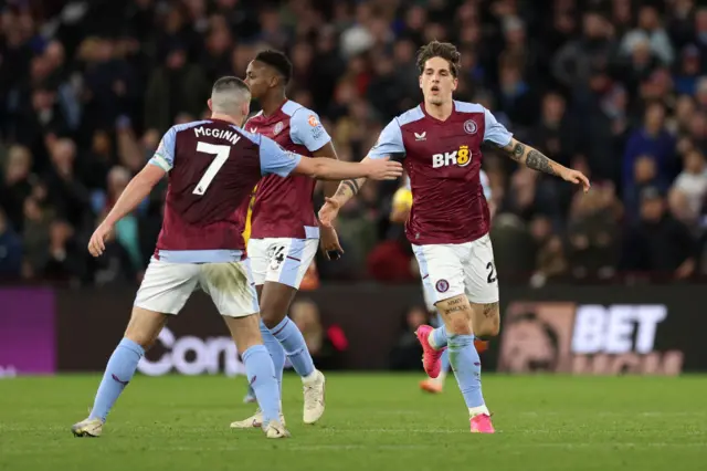 Nicolo Zaniolo celebrates with John McGinn