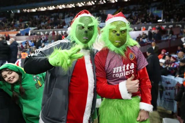 Aston Villa fans dressed at the Grinch