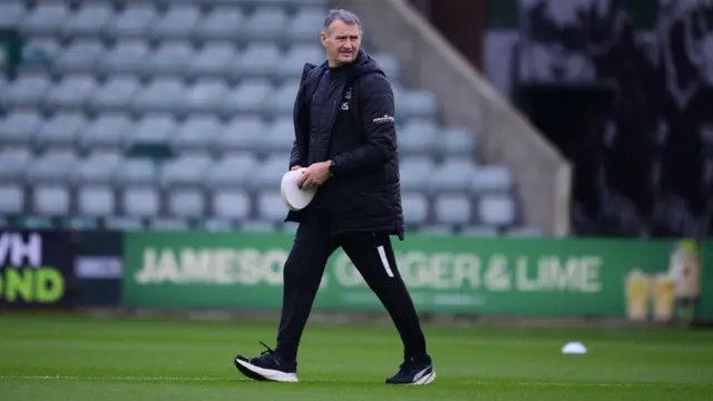 Kevin Nancekivell walking on the pitch