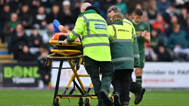 Lee Buchanan taken off on stretcher