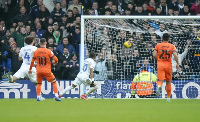 Crysencio Summerville scores Leeds' third from the penalty spot