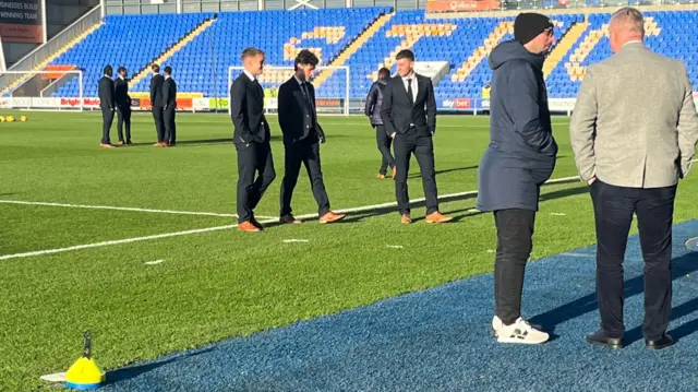 Peterborough players on pitch at Shrewsbury