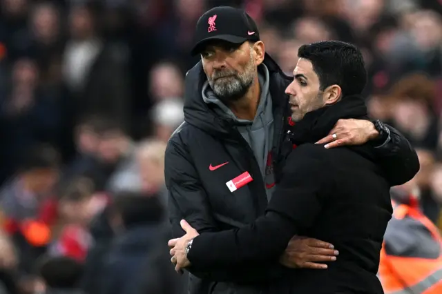 Arsenal boss Mikel Arteta and Liverpool Jurgen Klopp embrace