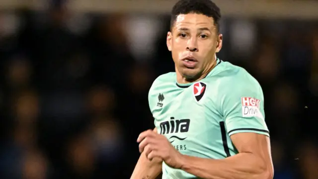 Curtis Davies in action for Cheltenham