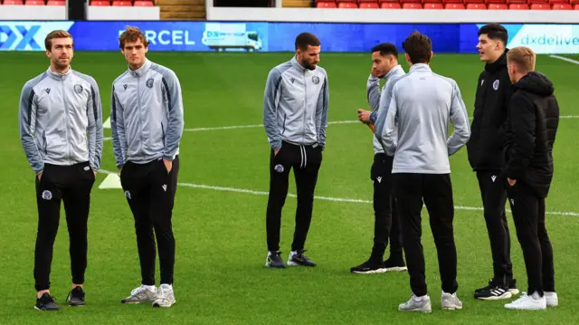 Stevenage players pre-match at Barnsley