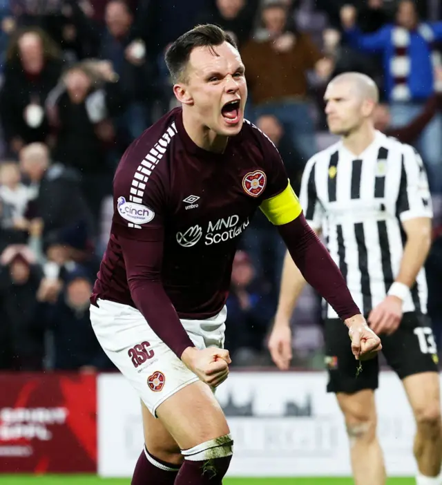 Lawrence Shankland celebrates scoring for Hearts against St Mirren