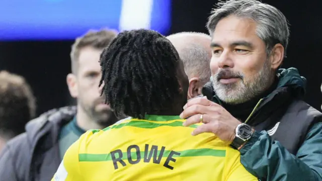 David Wagner hugs Jonathan Rowe