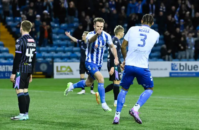 Marley Watkins wheels away after making it 2-0 to Kilmarnock