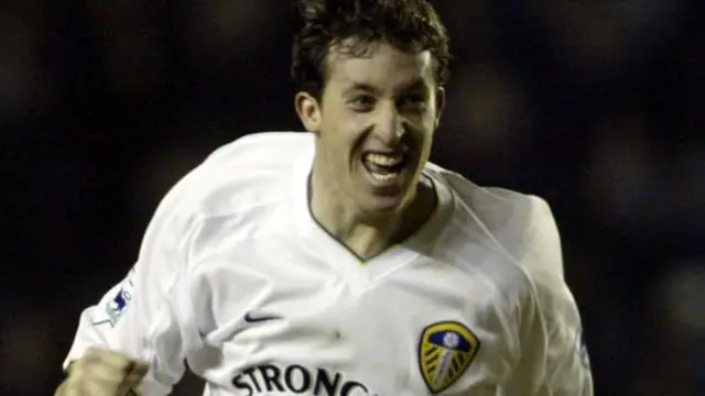 Robbie Fowler celebrates a goal for Leeds