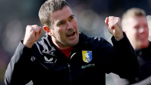 Nigel Clough celebrates a Mansfield win