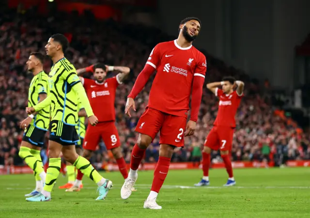 Joe Gomez screams to the sky after missing the net by inches.