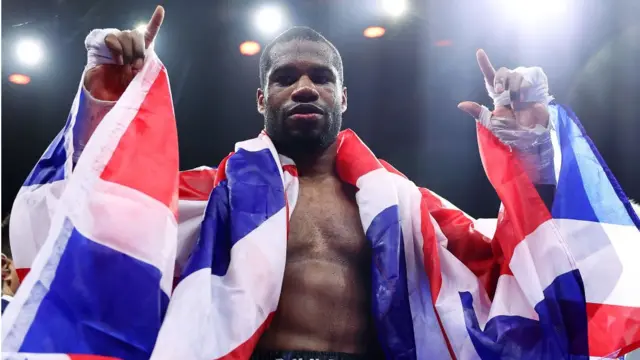 Daniel Dubois celebrates beating Jarrell Miller