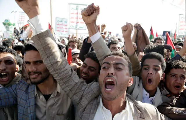 Yemenis chant slogans as they participate in a protest staged in solidarity with Palestinians and against the newly-created maritime coalition led by the US, on December 22, 2023 in Sana'a, Yemen