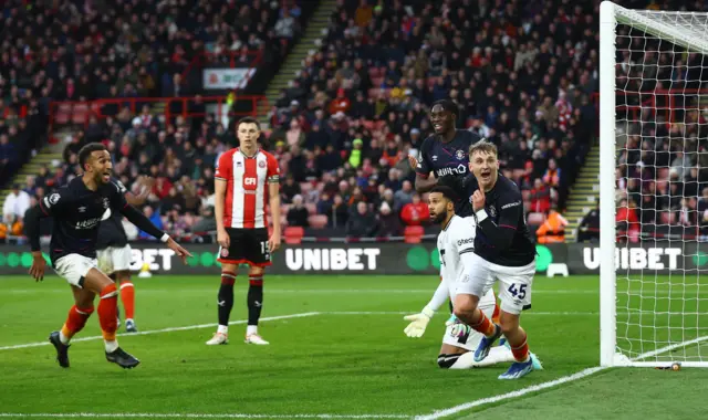 Luton Town's Alfie Doughty celebrates scoring their first goal