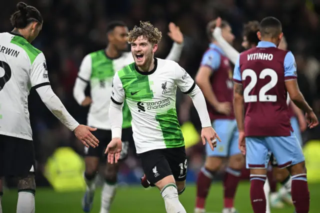 Elliott celebrates adding a second goal for Liverpool.