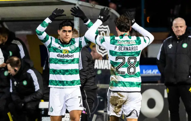 Celtic pair Luis Palma and Paulo Bernardo celebrate combining to open the scoring at Dens Park.