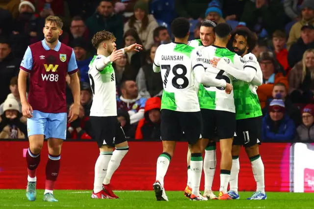 .Nunez is embraced by teammates after breaking his scoring duck with a goal at Burnley.