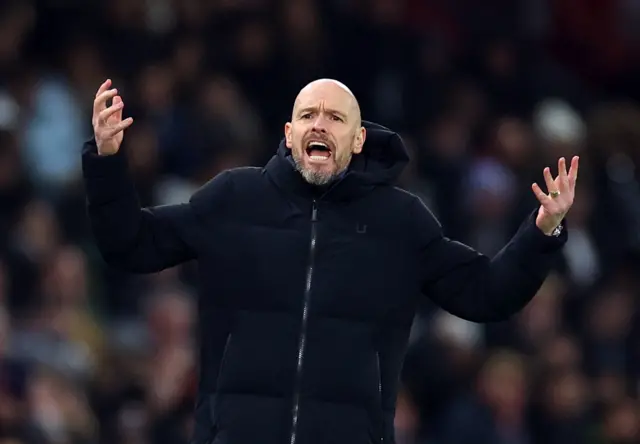 Ten Hag waves his hands and screams to the crowd to encourage more support.