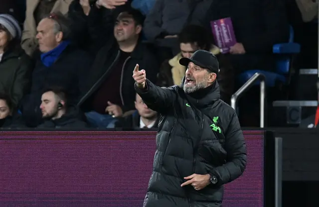 Klopp gives his side instructions from the sideline.