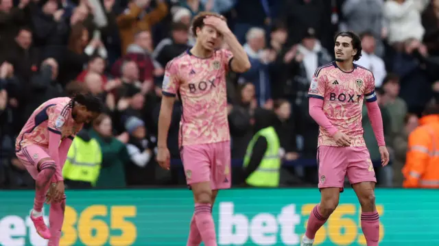 Leeds players look dejected after falling behind at Preston