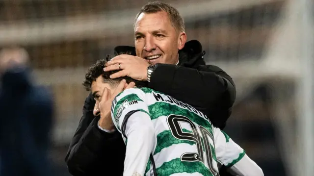 Brendan Rodgers congratulates Mikey Johnston