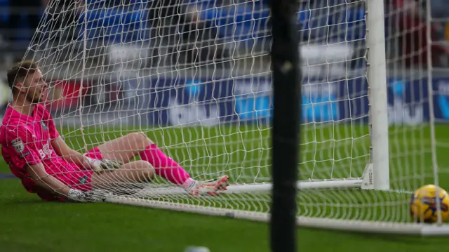 Plymouth keeper Conor Hazard concedes an own goal