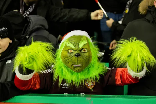 Hearts fan dressed as the grinch