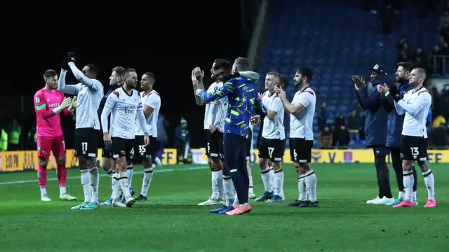 Derby players celebrate after game at Oxford