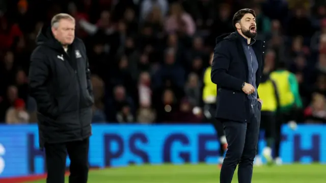 Southampton boss Russell Martin (right) barks instructions at his team