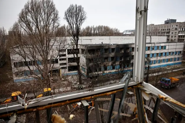 A burned out section of a heavily damaged hospital building