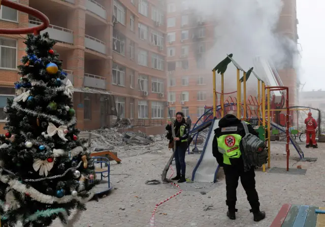 Police officers at the site of a shelling in Odesa